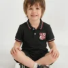 CHAMPIONS POLO | BLK | PK OLD MONEY